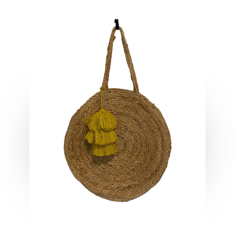 Bee & Willow home ardsle hand braided jute tote with a matchino tassel accent